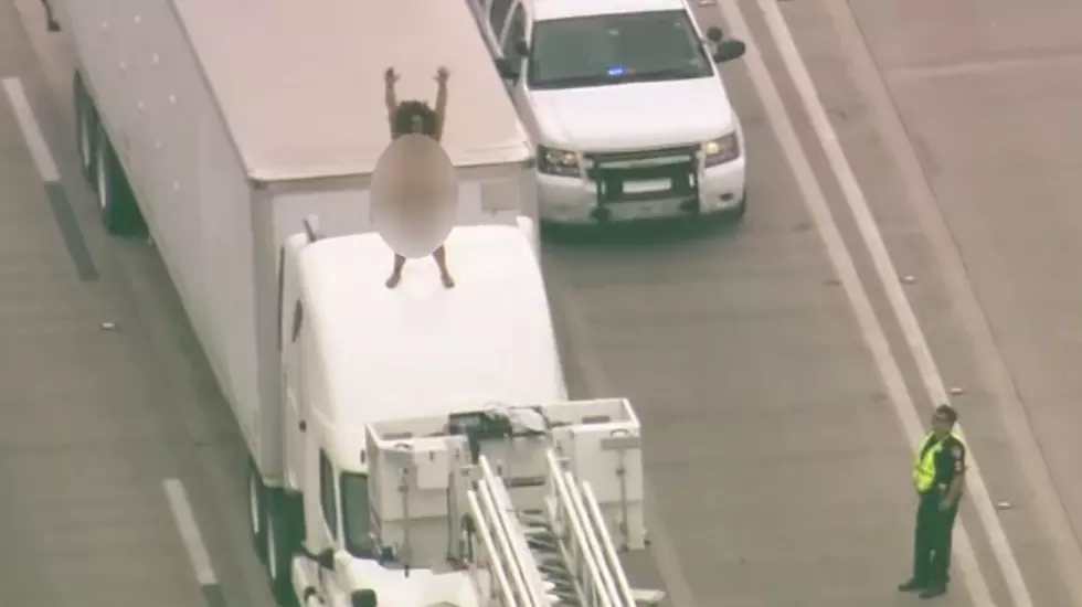 Naked Woman Dances on Top of Truck, Shuts Down Traffic