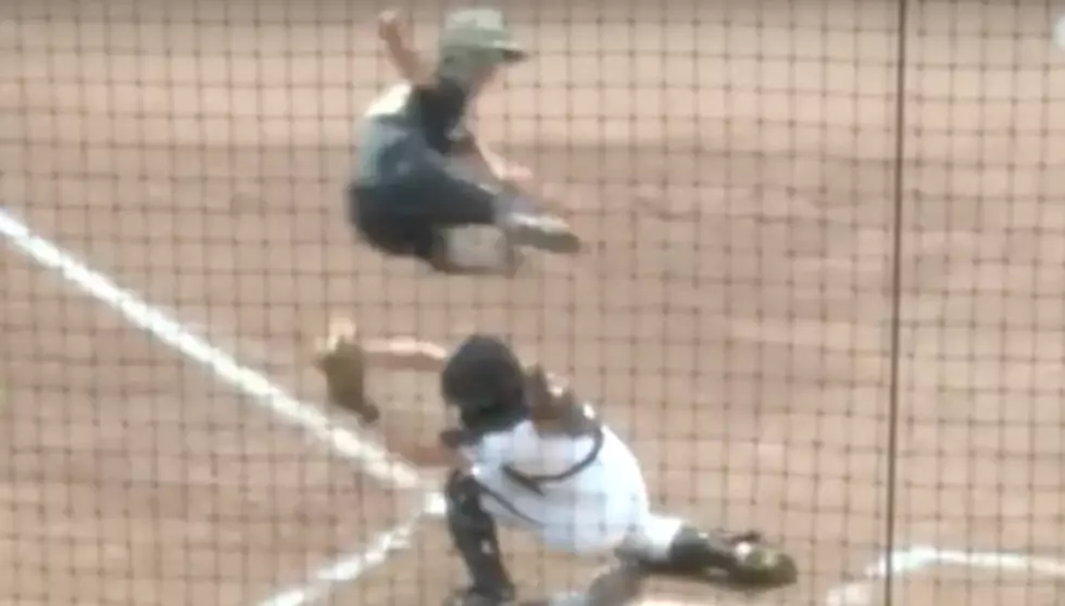 Watch Army Softball Player Hurdle Catcher to Score [VIDEO]