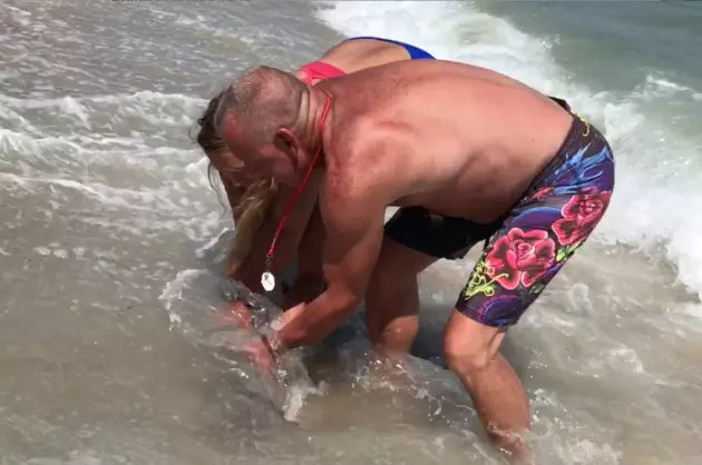 Incredible Bare-Handed Shark Rescue Caught in Action