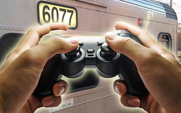 Shoeless Hudson Valley Train Passenger Plays PS4 on Huge Screen