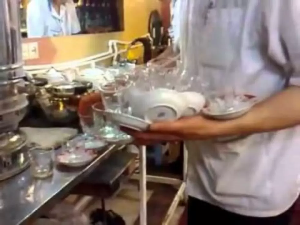 Waiter Carries Twelve Tea Cups In One Hand With Tea [Video]