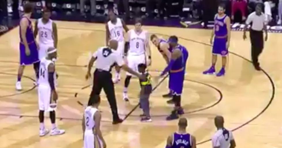 Cute Kid Runs Onto Court to Give Carmelo Anthony a Hug [WATCH]