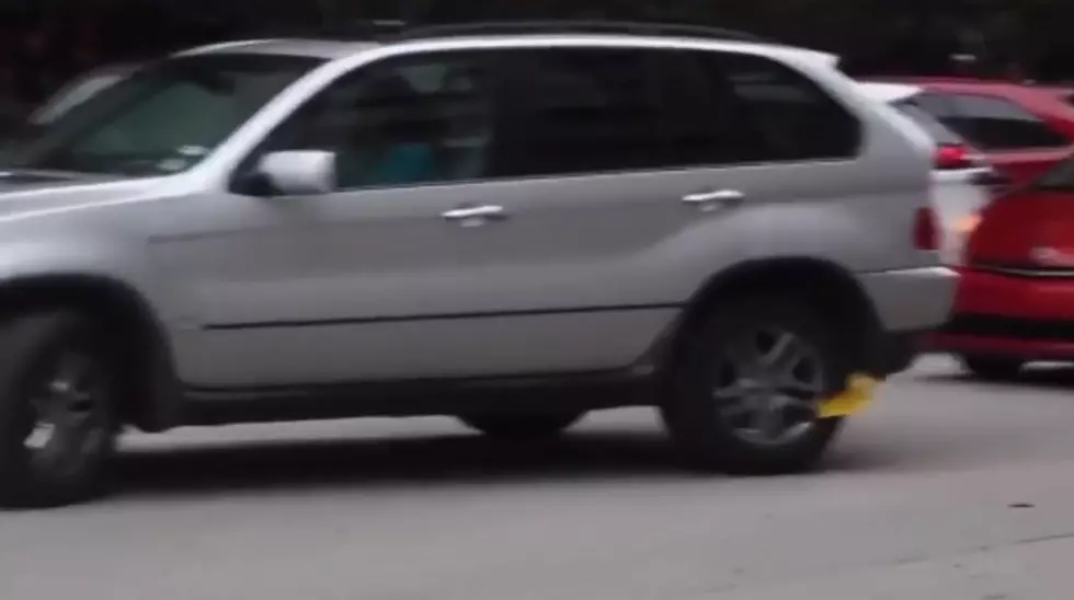 Woman’s Car Gets Booted, Doesn’t Stop Her From Driving Away