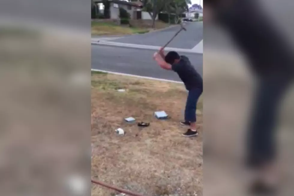 Son is Forced to Smash His Xbox for Getting Bad Grades