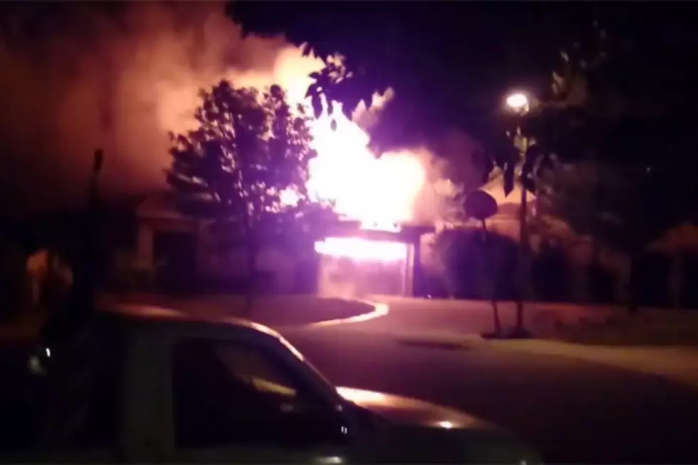 Watch a Man Save His Neighbor From a Burning House