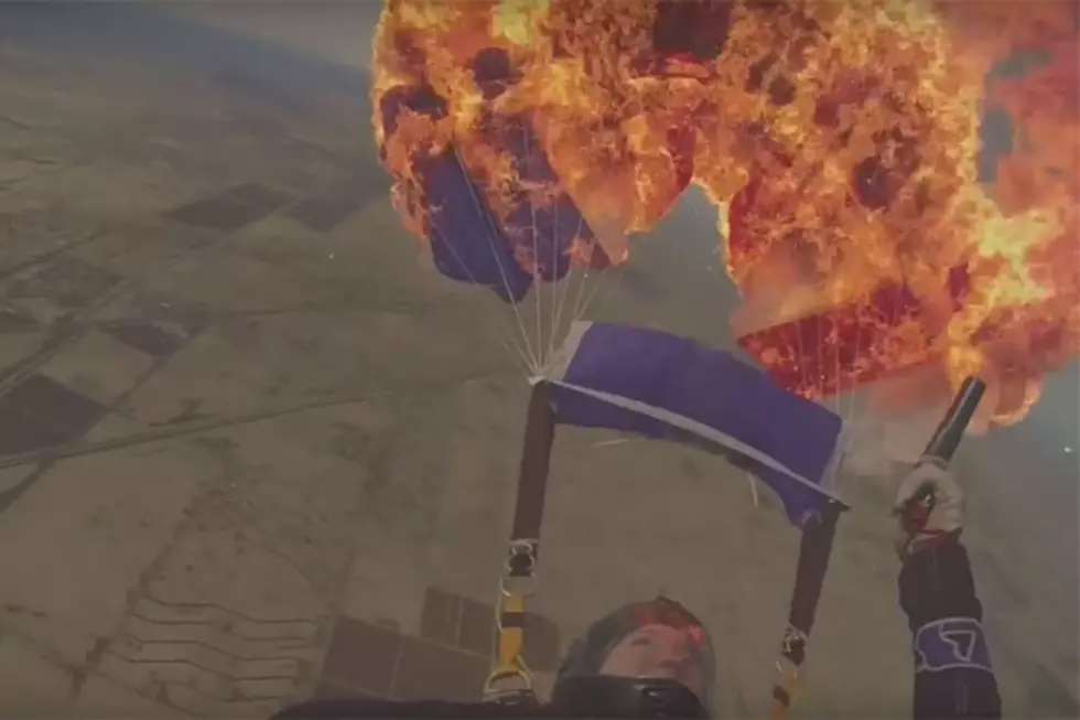 Skydiver Shoots Her Own Parachute with a Flare Gun
