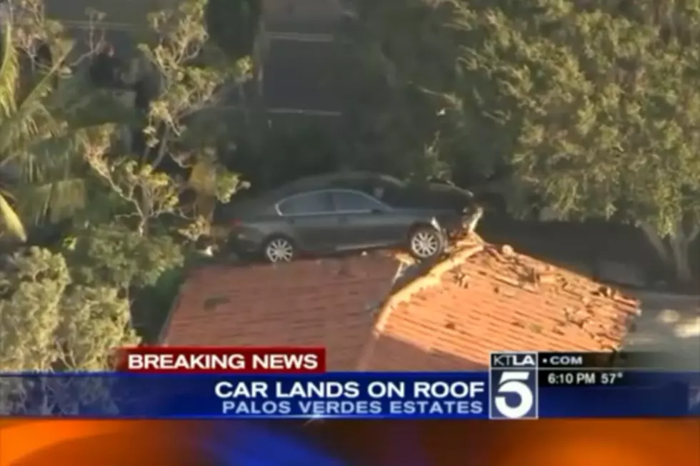 Car Lands on Top of Garage Roof