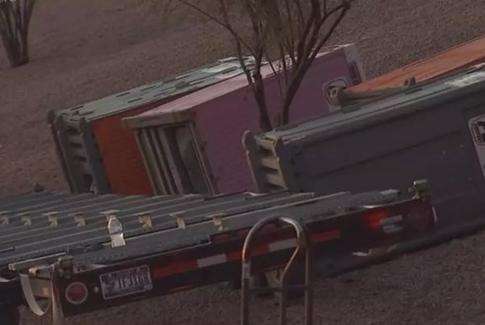 Truck Carrying Port-A-Potties Rolls Over on Highway
