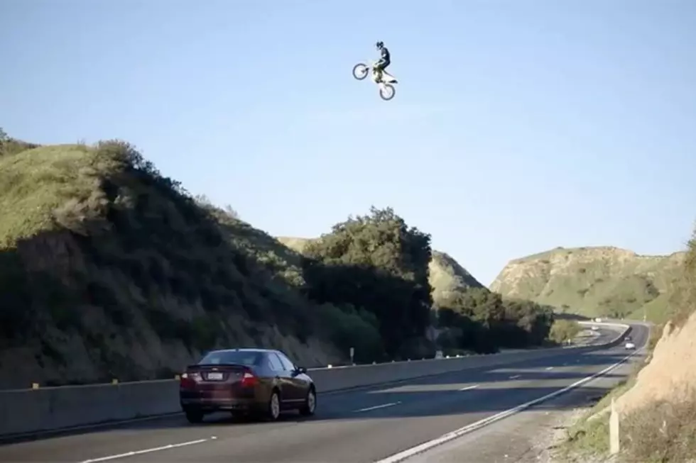 Man Flies Over California Freeway in Dirt Bike Stunt