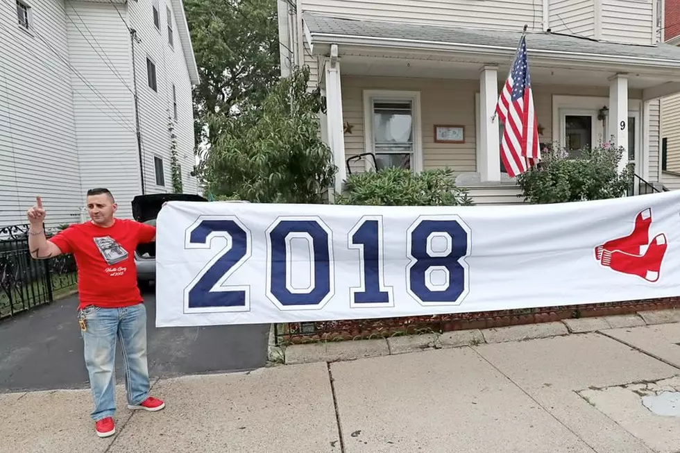 Three Fans Hold Red Sox Championship Banner Hostage