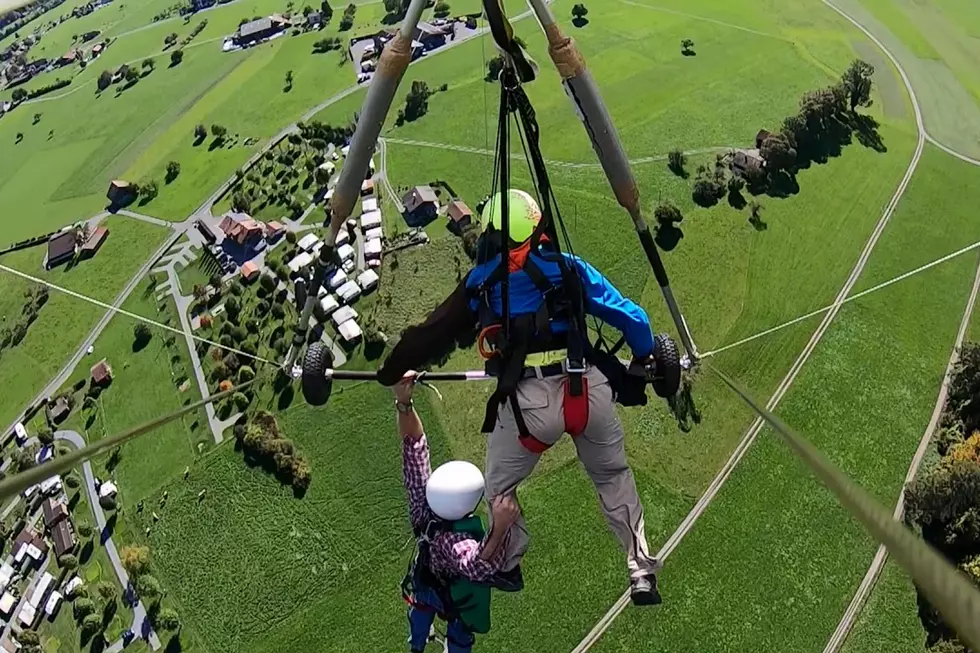 First-Time Hang Glider Hangs On For Dear Life After Not Strapping In
