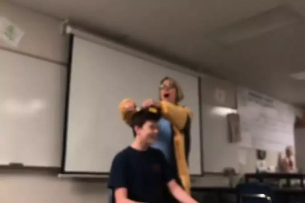 High School Teacher Sings National Anthem While Cutting Student’s Hair