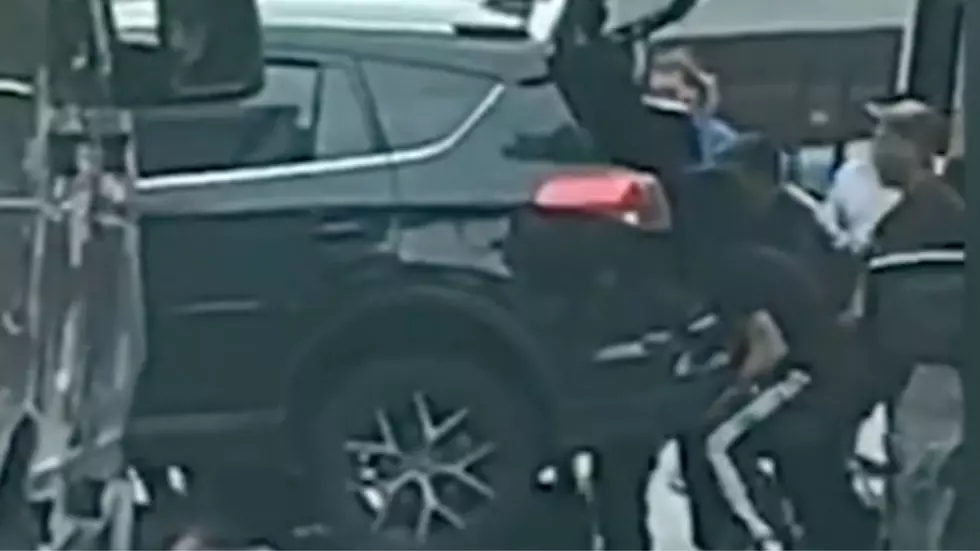 Good Samaritans Lift SUV Off Pedestrian After Accident