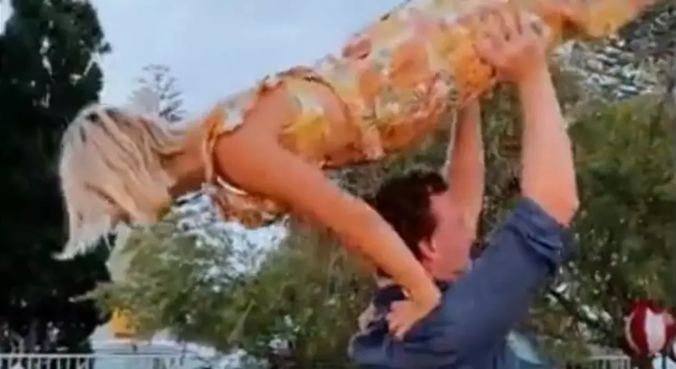 Woman Almost Snaps Her Neck Drunkenly Trying the “Dirty Dancing” Lift