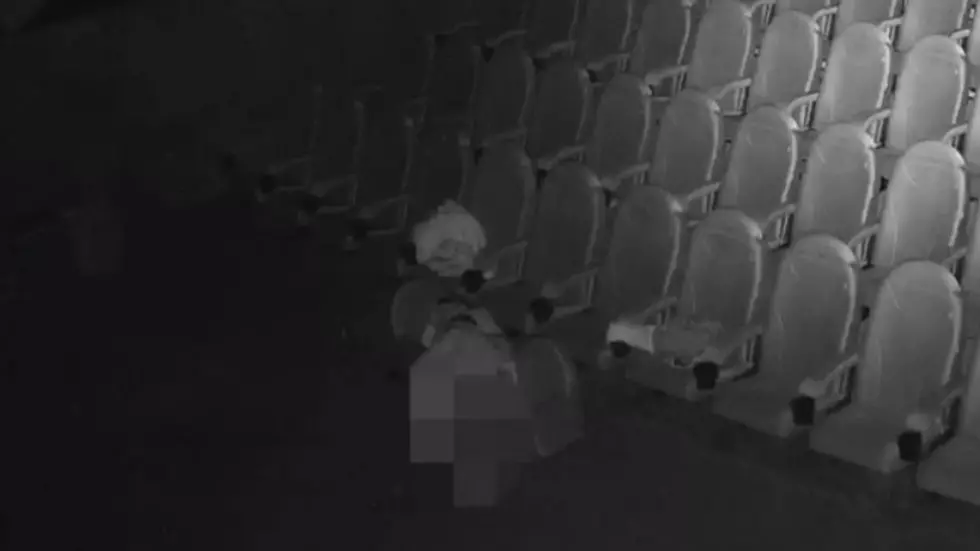 Frisky Couple Who Snuck into Closed Movie Theater Caught on Camera