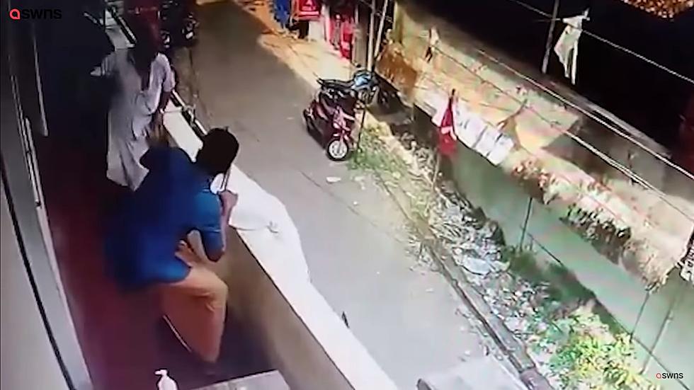 Hero Saves Man Falling Off Balcony By Catching His Foot