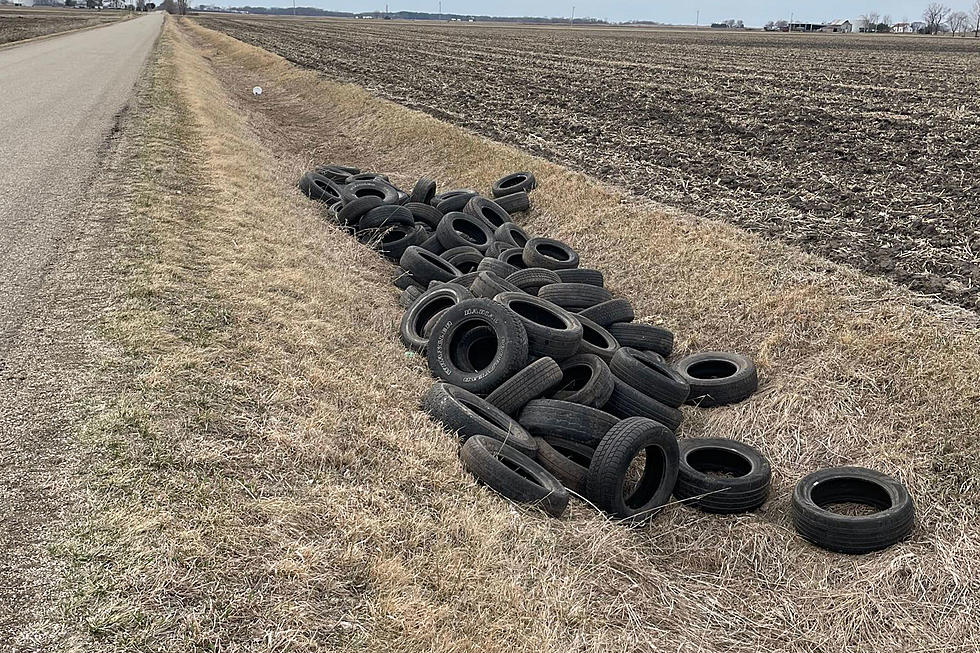 Some Dirtbag Dumped Close to 100 Used Tires into Area Ditch