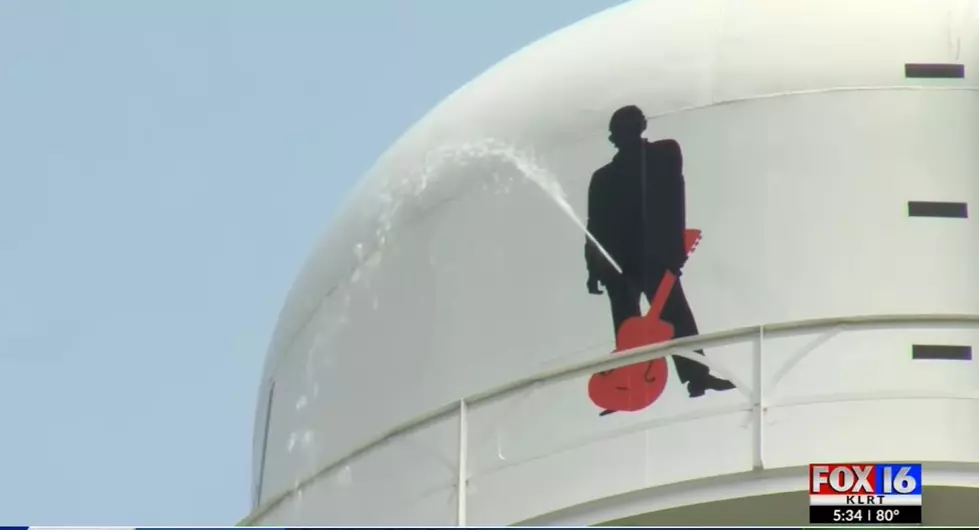 Water Tower With Johnny Cash Silhouette Springs a Hilarious Leak
