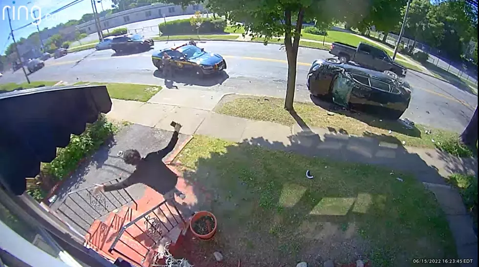 Crazy Video Shows Police Chase Rollover in Front Yard, Suspects Flee