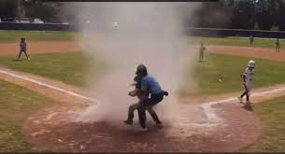 Umpire Pulls 7-Year-Old From Dust Devil During Baseball Game