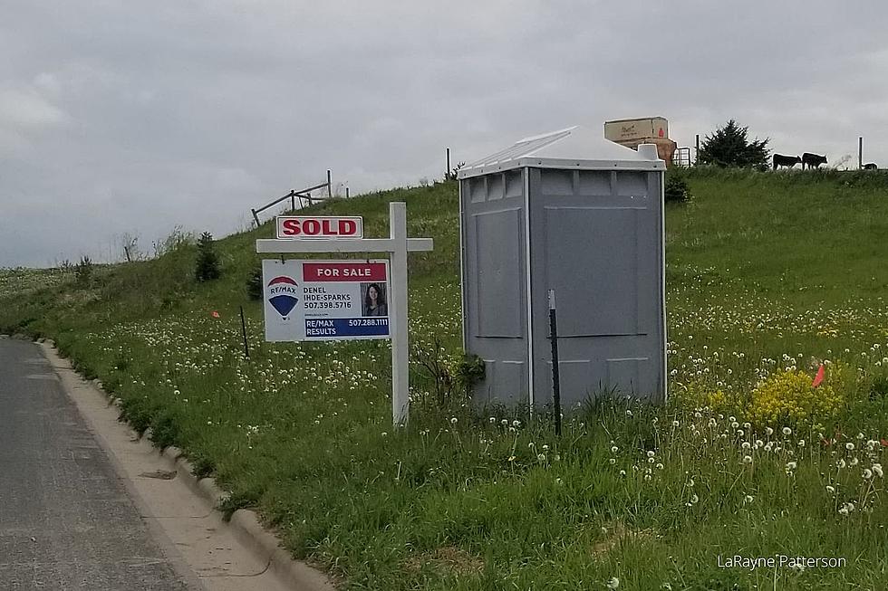 Famous Comedian Just Made Fun of This Rochester REALTOR’s Sign by a Porta-Potty