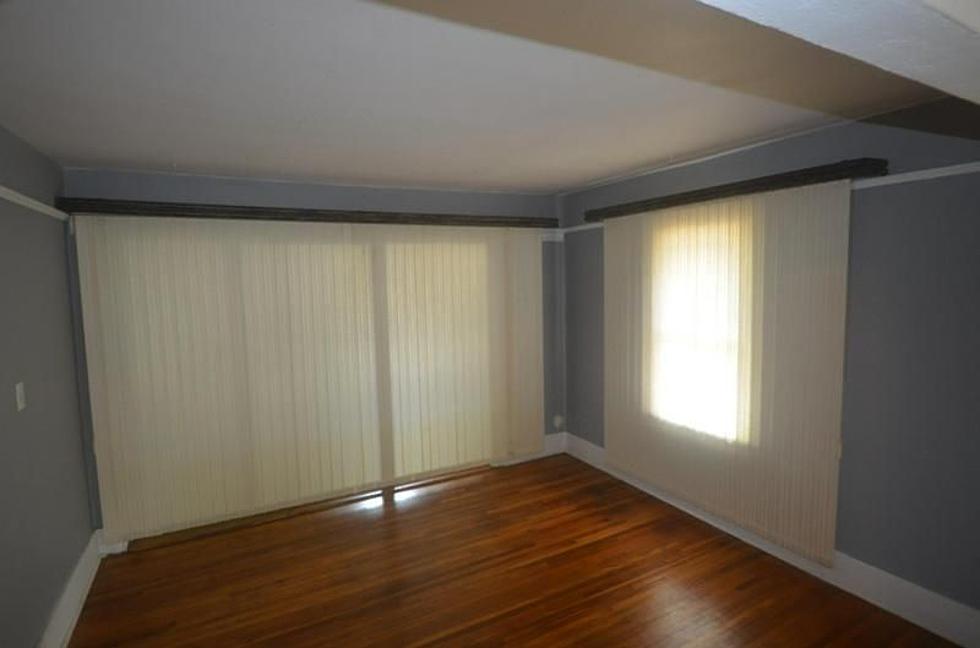 Love Vertical Blinds? Yes? Then Buy This Rochester Home!