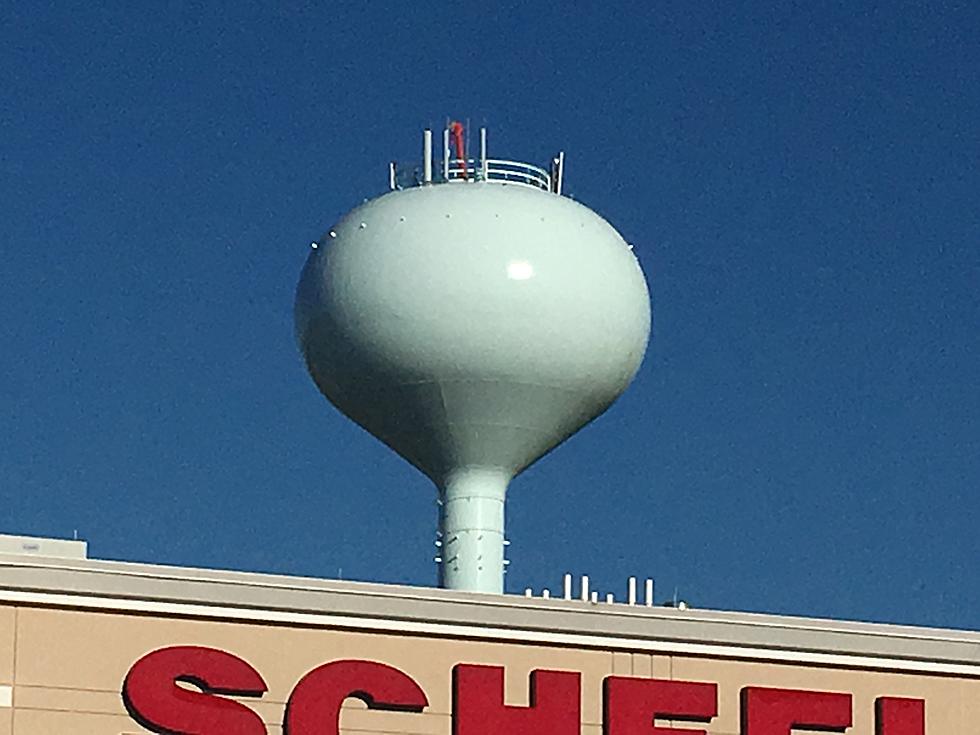 Why Is A Wacky Inflatable Arm Guy Atop The Water Tower Near The Apache Mall? – [WATCH]