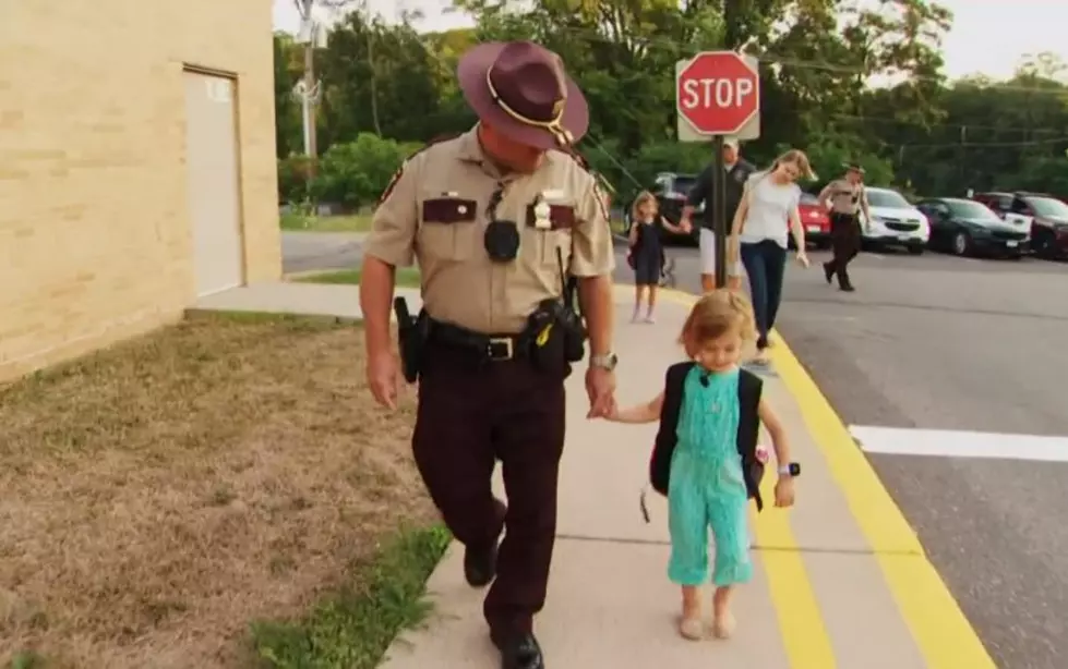 Minnesota Officer Escorts Girl to First Day of Kindergarten 5 Years After Saving Her Life