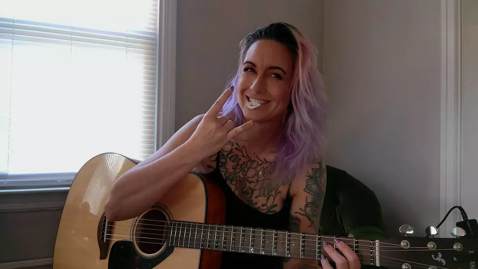 Kat's Learning Guitar With Nearly 80K Songs at Her Fingertips