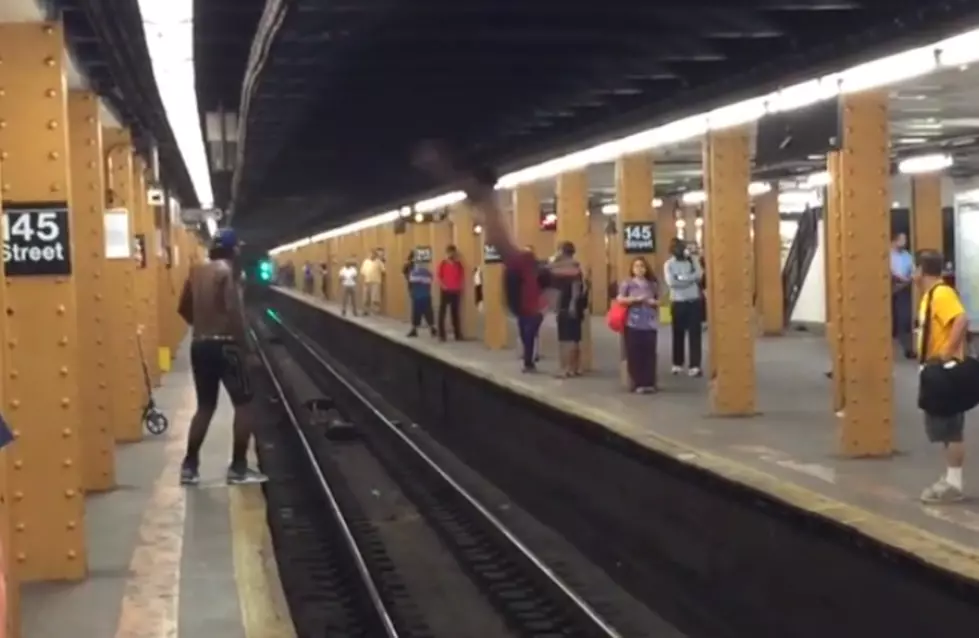 Guy Attempts Subway Jump, Fails