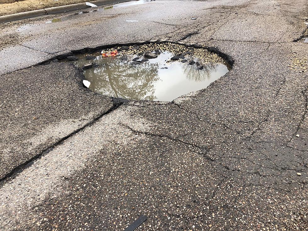 We Think Rockford Is Home To The World’s Biggest Pothole