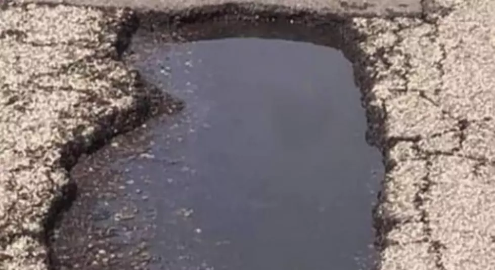 This Pothole Shaped Like Illinois Is The Best & Worst Thing