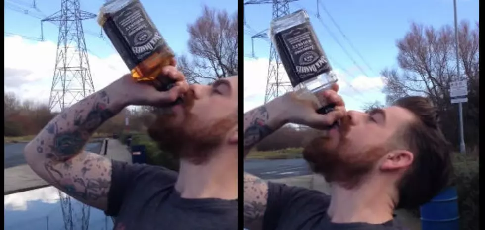 Watch This Man Drink An Entire Bottle Of Jack Daniels in 15 Seconds