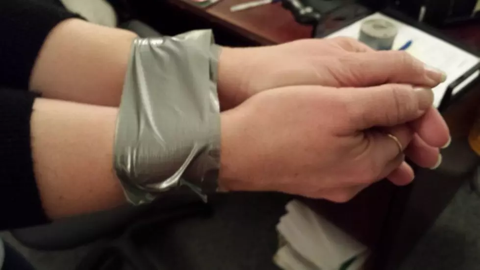 How to Escape from Duct Tape Bound Wrists [Video]