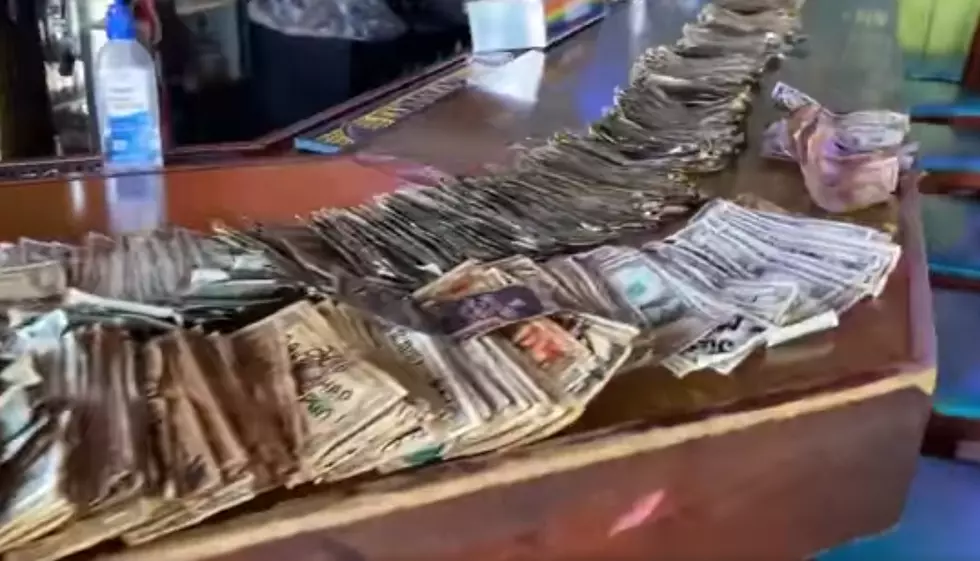 Bar Removes $3,714 in $1 Bills Stapled to the Walls to Pay Their Employees