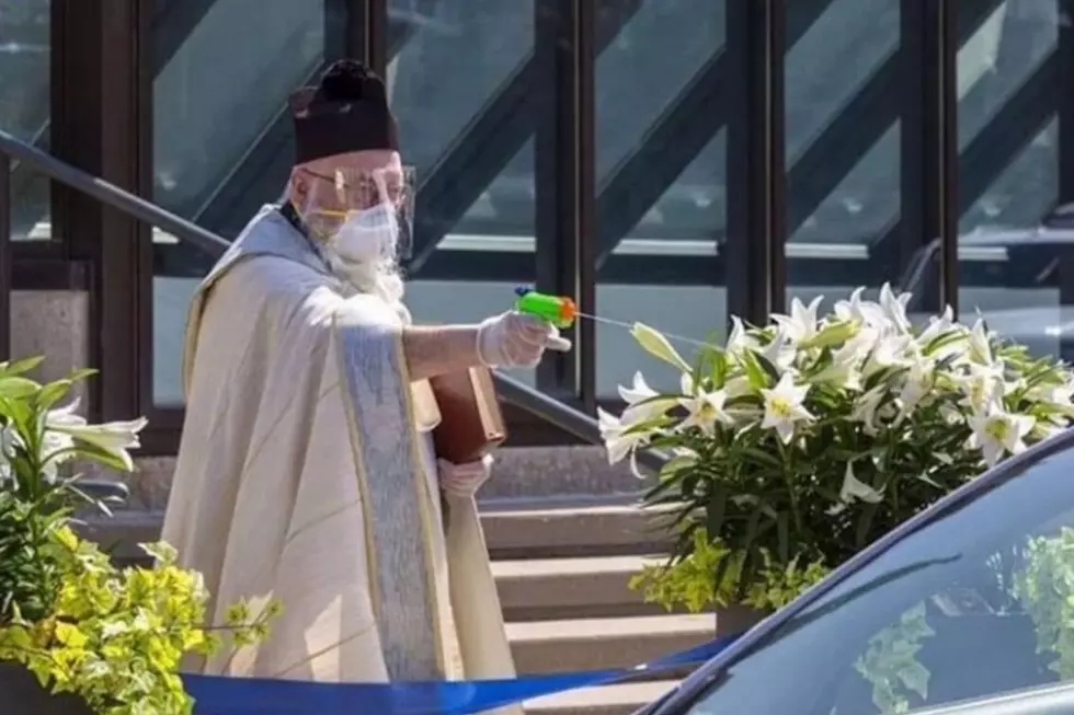 Priest Uses Squirt Gun To Blast Holy Water At Drive-Thru Church Services