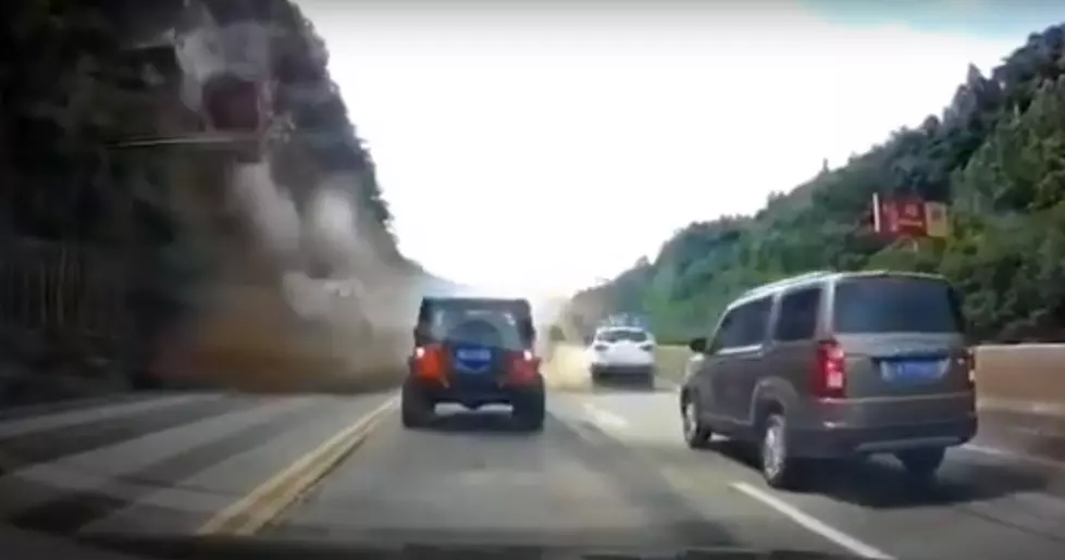 Giant Rocks Smash Into Cars After Tumbling Down a Mountain (VIDEO)