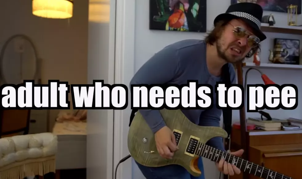 16 Ways to Hold a Guitar (Video)