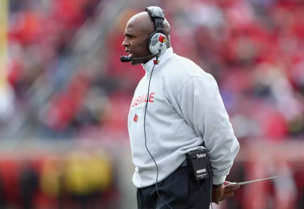 Louisville Coach Strong Heads to Texas