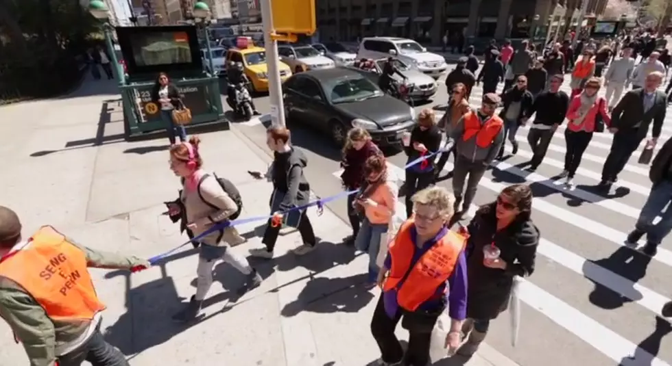 Seeing Eye People Guide Pedestrians as They Text While Walking [VIDEO]