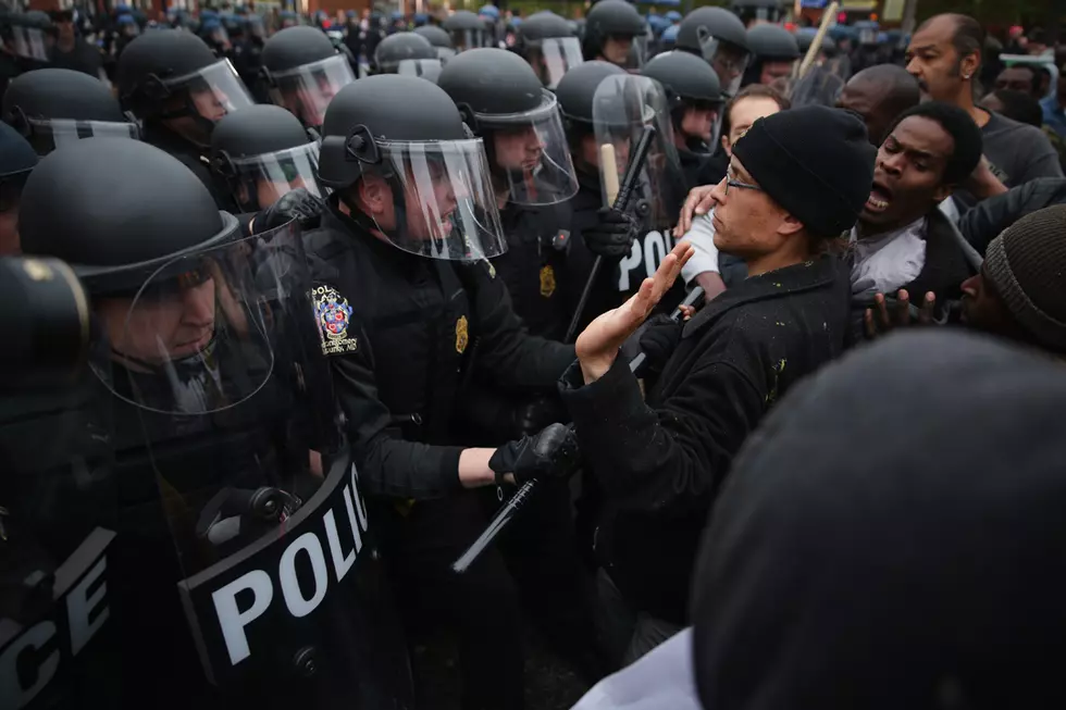 Tensions Still Rising in Baltimore Following Funeral for Freddie Gray, as Police and Protestors Confront Each Other
