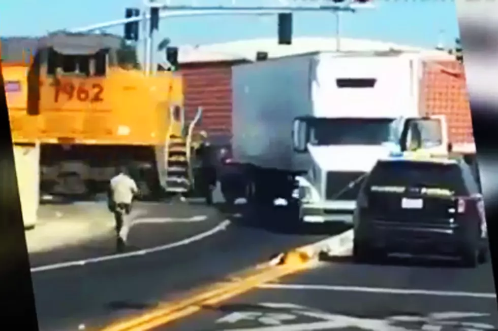 Speeding Train Smashes Through Truck — Driver & Cop Barely Escape Being Hit