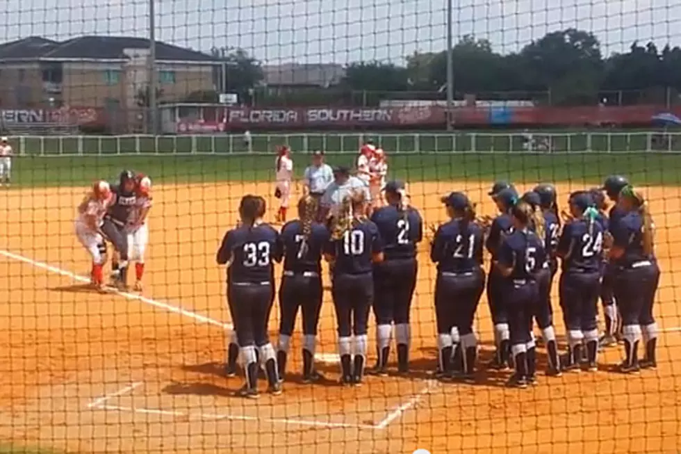 Softball Pitcher Gives Up Game-Winning HR, Helps Injured Batter Round the Bases [VIDEO]