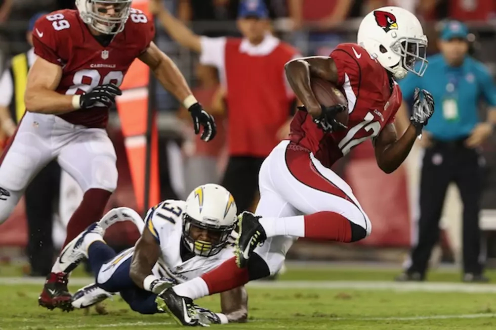 Cardinals Rally By Chargers, 18-17; Lions Rout Giants, 35-14