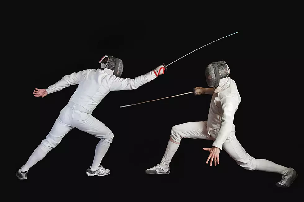 Watch an Olympic Fencer Drop His Cell Phone -- During Match