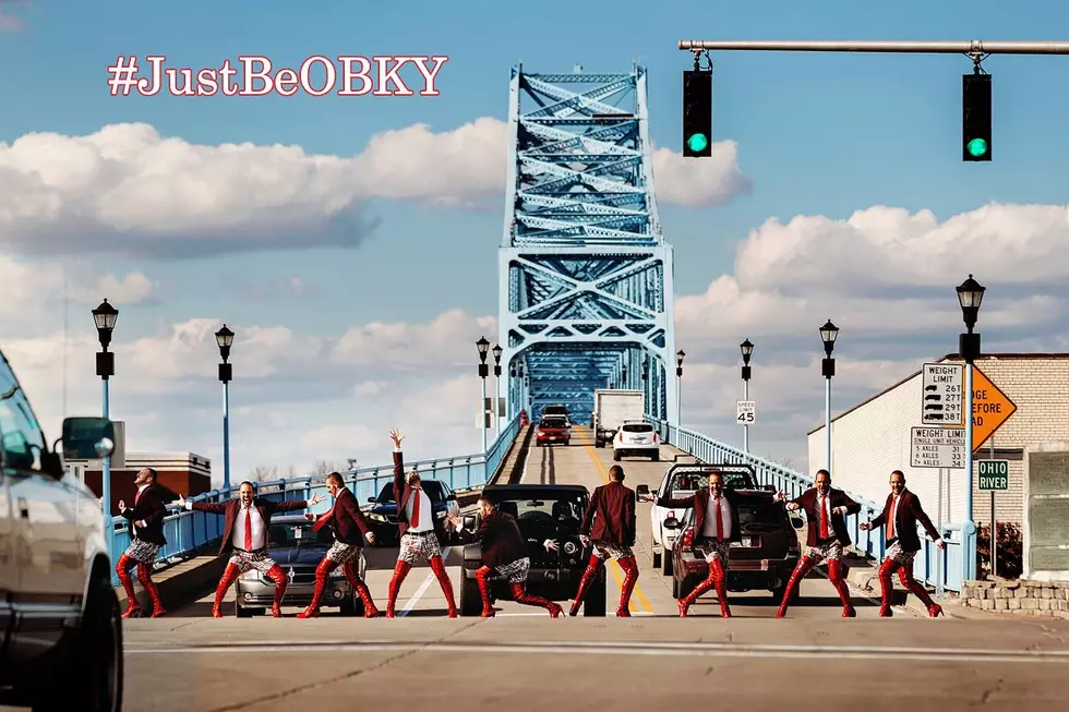 These Red Boots Are Made for Walking Across the Blue Bridge [Photos]