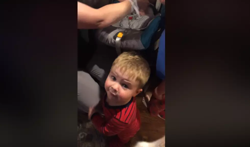 TODDLER IS OVER THE MOON FOR NEW BROTHER