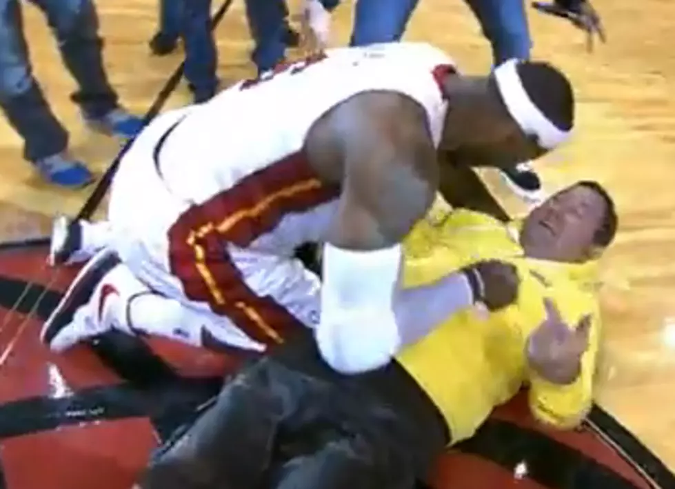 LeBron Tackles Miami Heat Fan Who Hits $75,000 Shot [VIDEO]