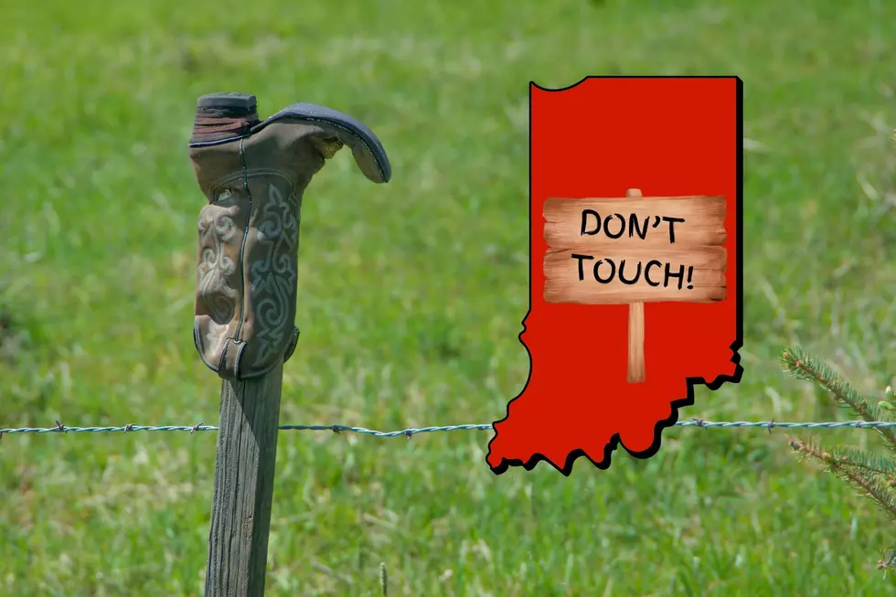 Why You Should Not Touch Boots on Fence Posts in Rural Indiana