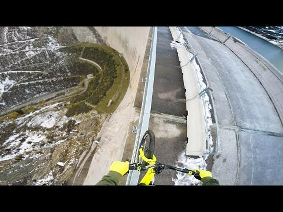 Bicyclist Teeters on a Railing 650 feet In The Air